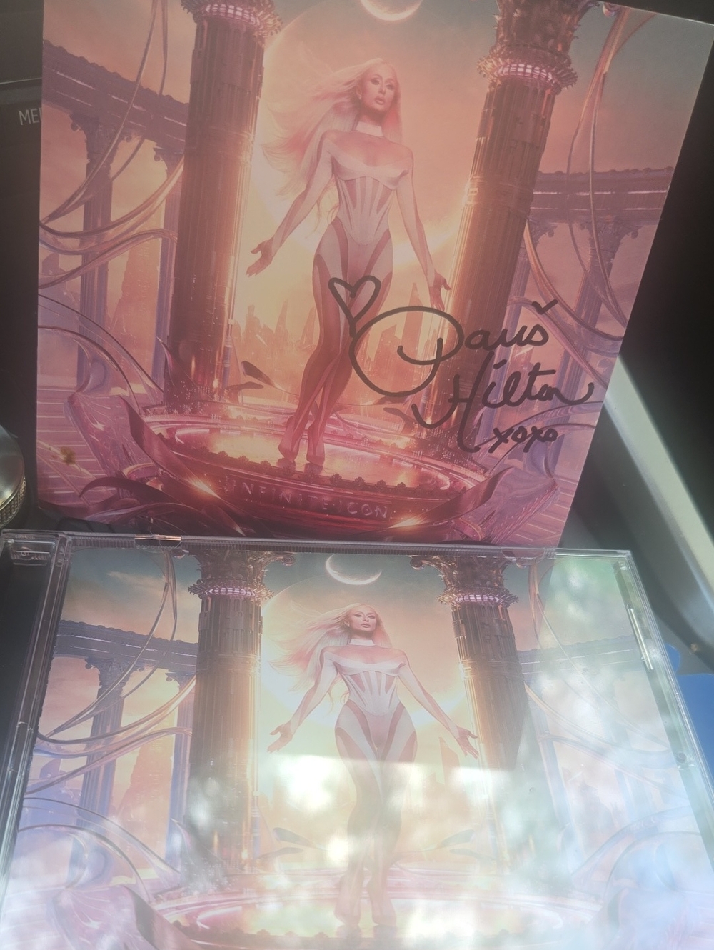 Paris Hilton AUTOGRAPHED ICON CD.